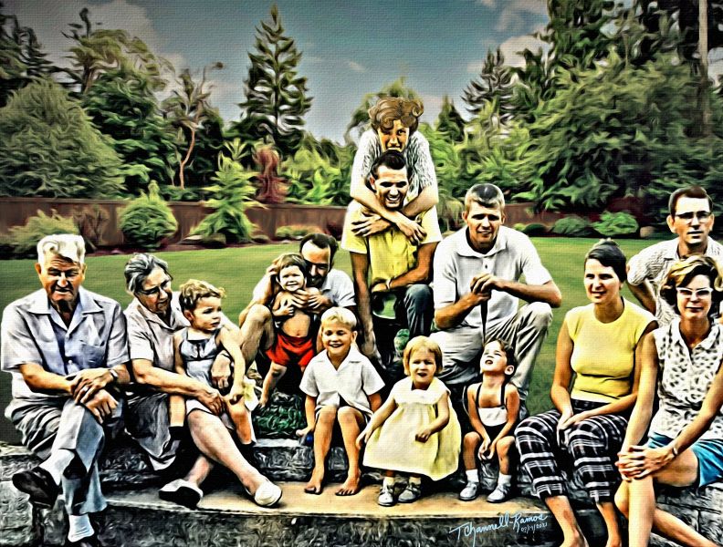 Family photo of a large group of people sitting on a stone bench in a garden.